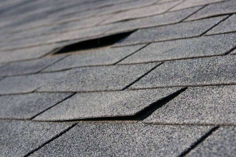 Damaged asphalt roof shingles Orlando